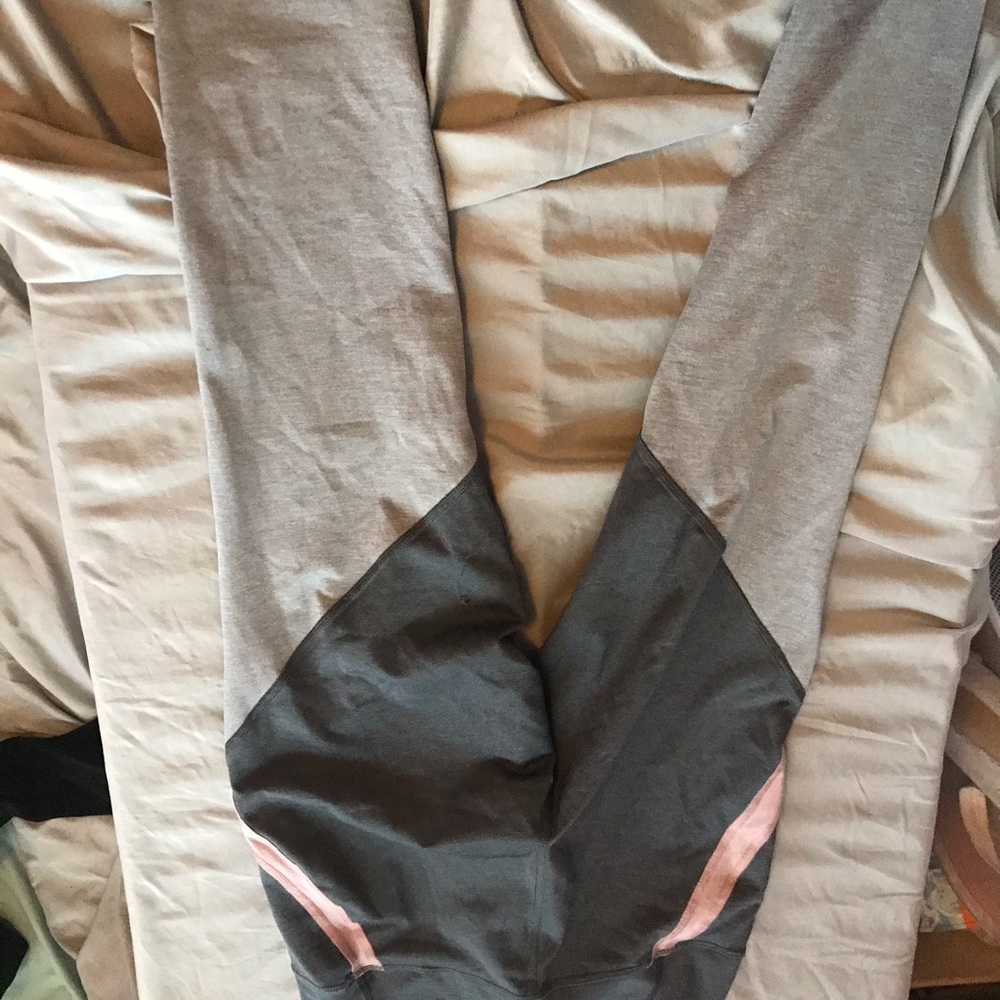 pair of 7/8 active compression leggings